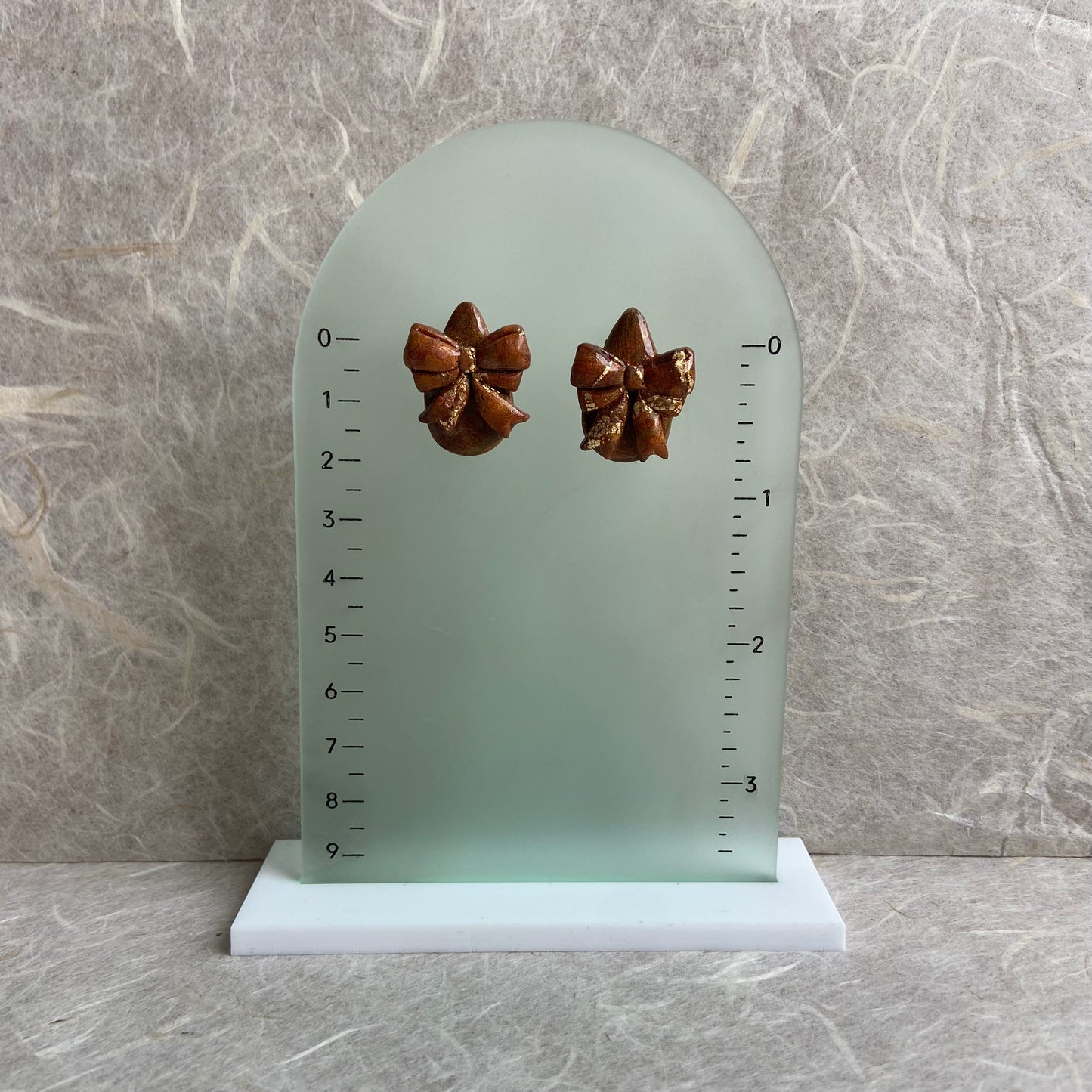 Egg with a bow Stud Earrings
